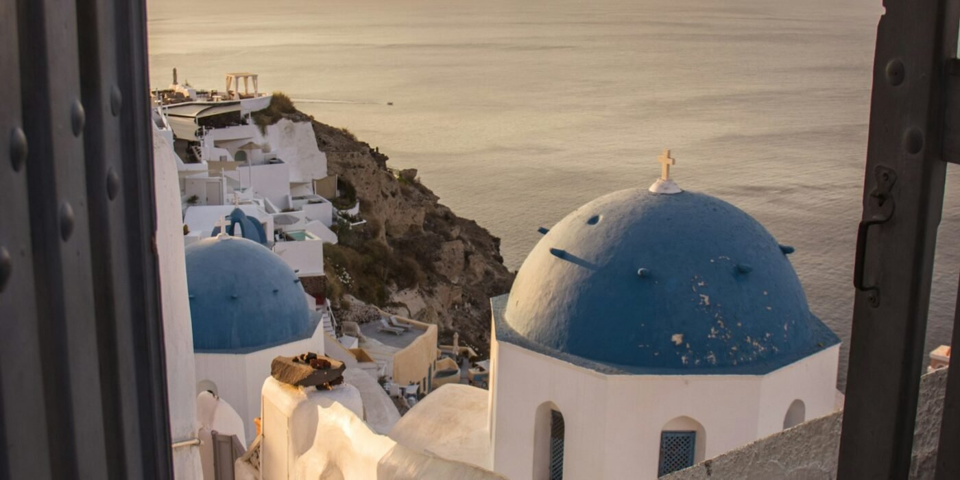 Santorini blue domes at sunset