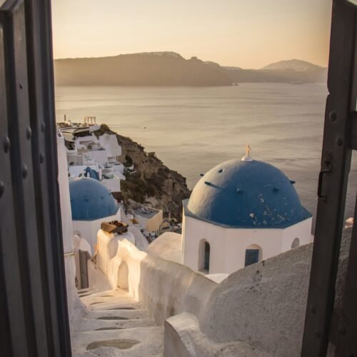 Santorini blue domes at sunset