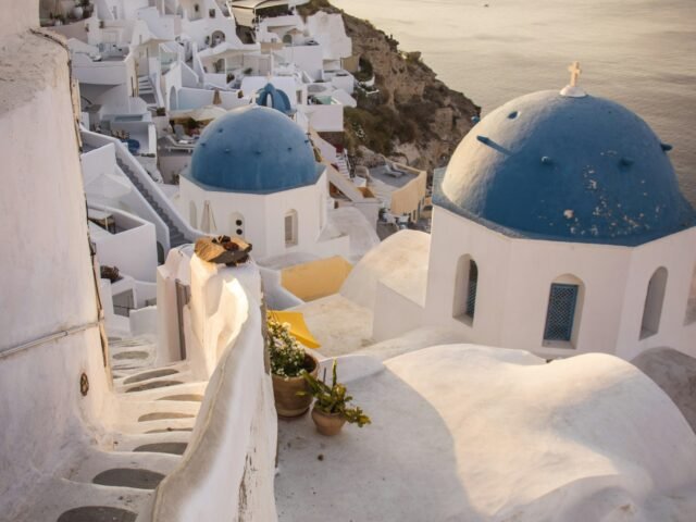 Blue-domed church overlooking Santorini caldera